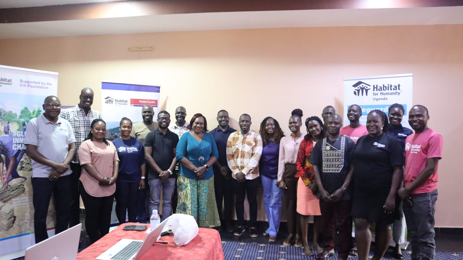 Community partner sharing Habitat Uganda impact